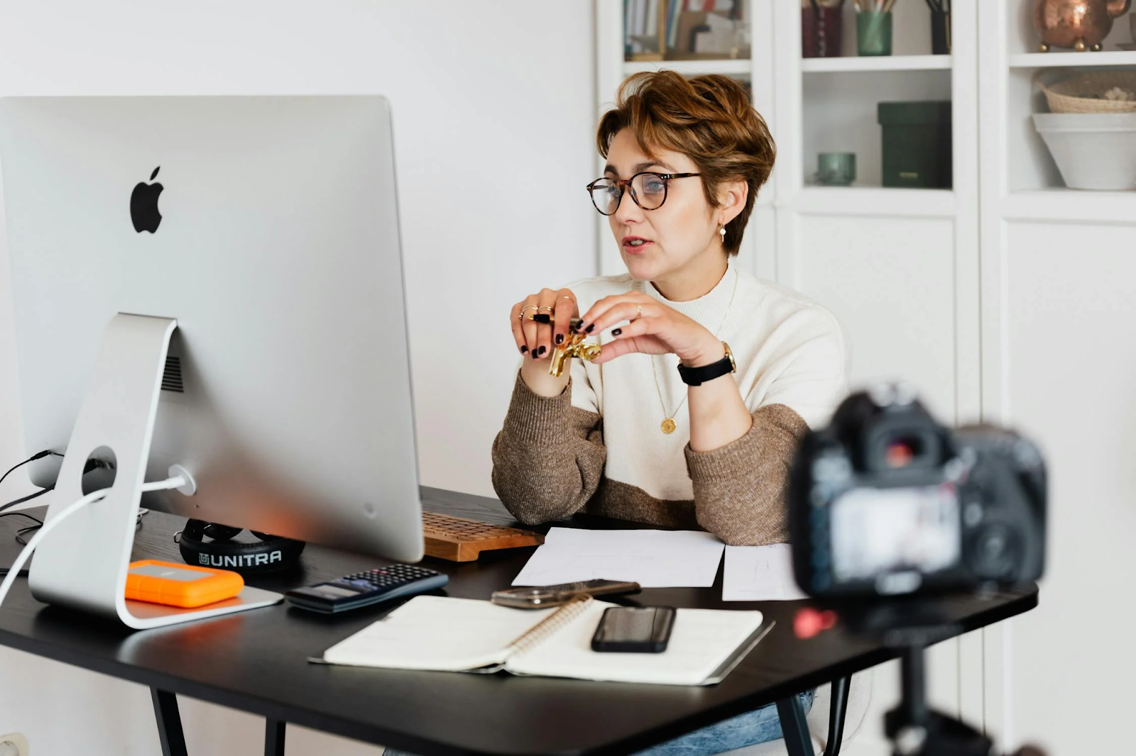 A short-haired woman during a video chat 